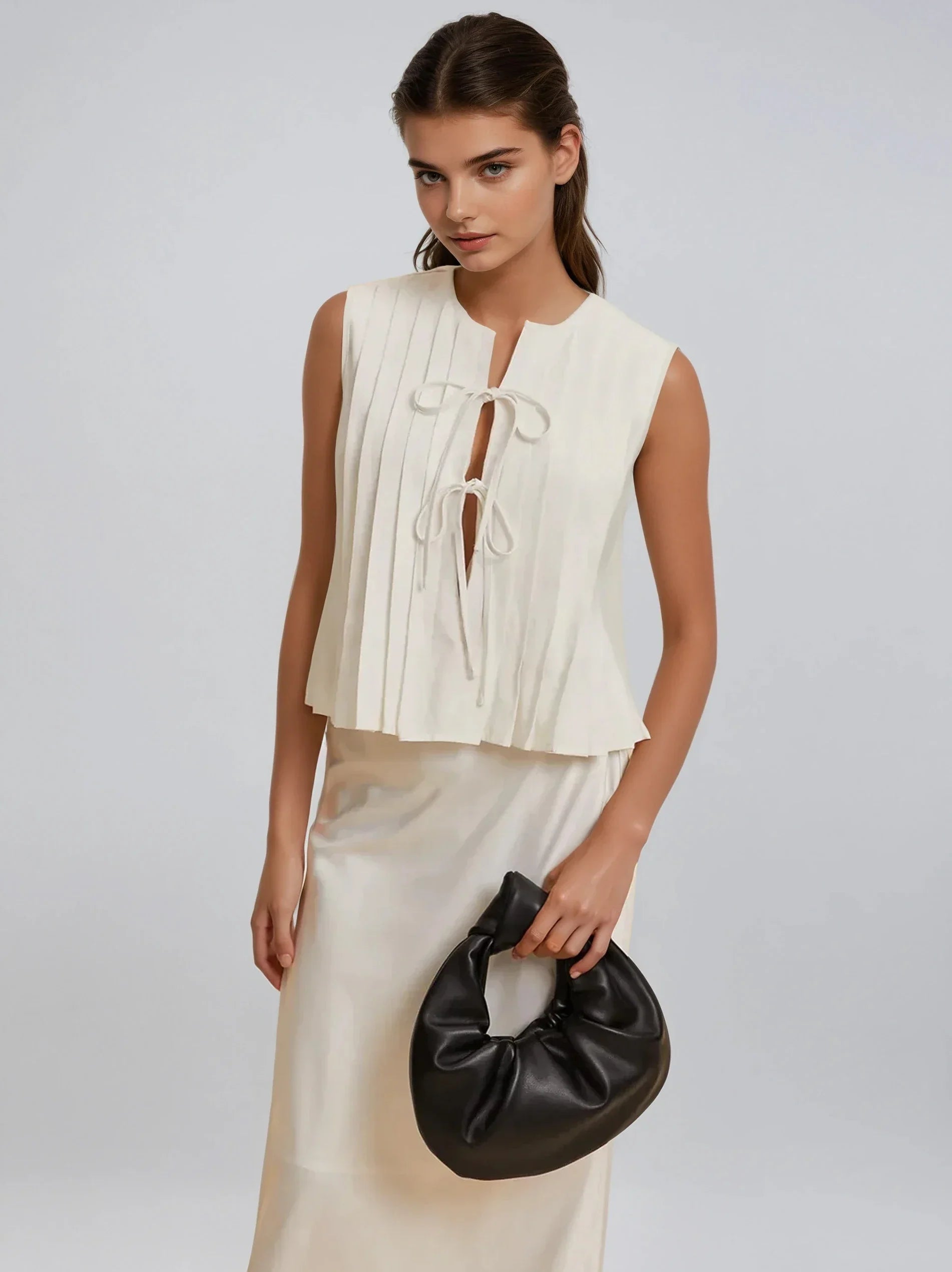 Pleated Knotted Sleeveless Blouse - LA FEMME WANDERER
