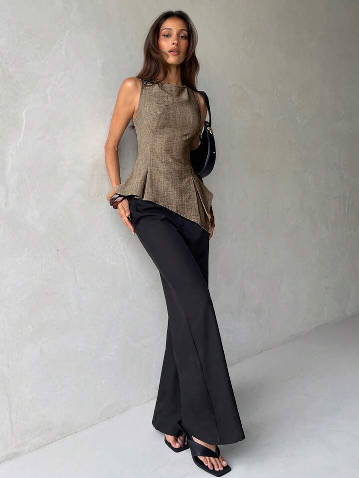 Modern Sleeveless Peplum Blouse with Elegant Asymmetric Hem